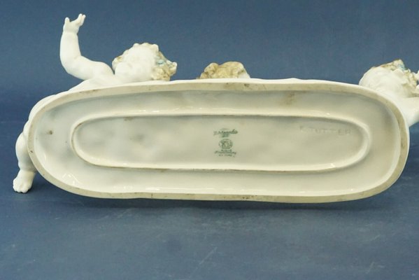 20th Century Porcelain Sculpture with Triptych of Putti by Karl