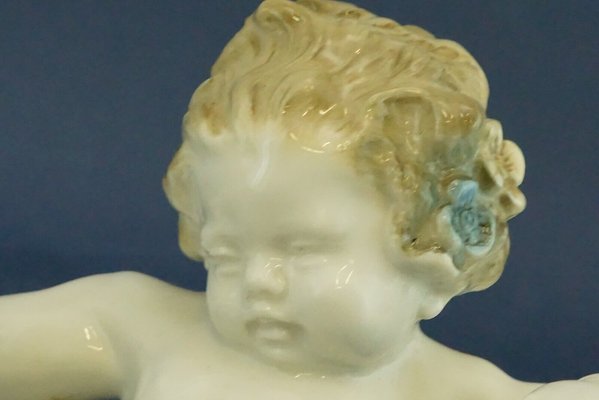 20th Century Porcelain Sculpture with Triptych of Putti by Karl
