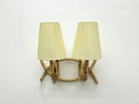 Wandlampe aus Rattan Bambus von Louis Sognot, 1960er bei Pamono kaufen