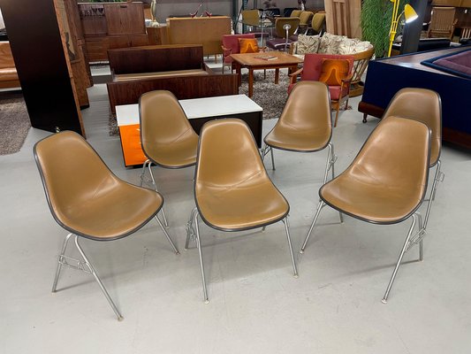 Stacking Shell Chairs with Brown Naugahyde Pads by Herman Miller