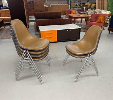 Stacking Shell Chairs with Brown Naugahyde Pads by Herman Miller