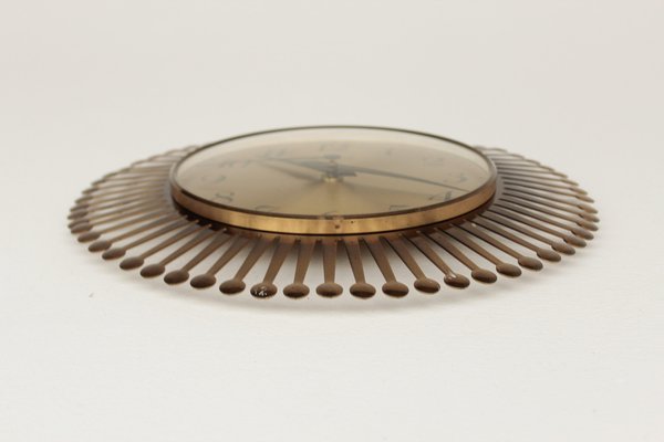 Mid-Century Brass Sunburst Wall Clock, 1960s for sale at Pamono