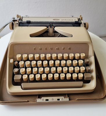 Vintage German Triumph Typewriter with Case, 1960s for sale at Pamono
