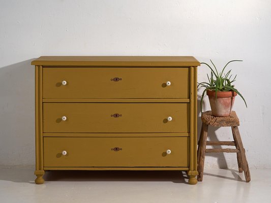 Mustard Yellow Antique Chest of Drawers, 1920s for sale at Pamono