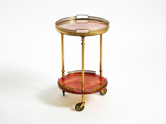 Kleiner runder Servierwagen aus rotem Ziegenleder von Aldo Tura, Italien, 1960er bei Pamono kaufen