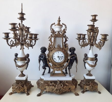 Lancini Clock with Louis XVI Style Candlesticks, 1940s, Set of 3 Lancini Clock with Louis XVI Style Candlesticks, 1940s, Set of 3