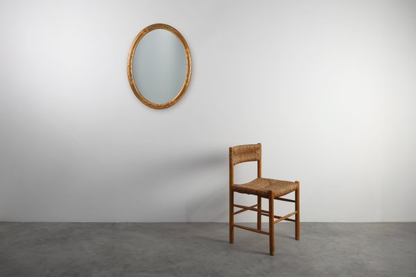 Un grand miroir doré sculpté en bois d'hêtre style Louis XV sur