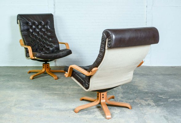 Coppia di sedie girevoli vintage in metallo cromato e tessuto di