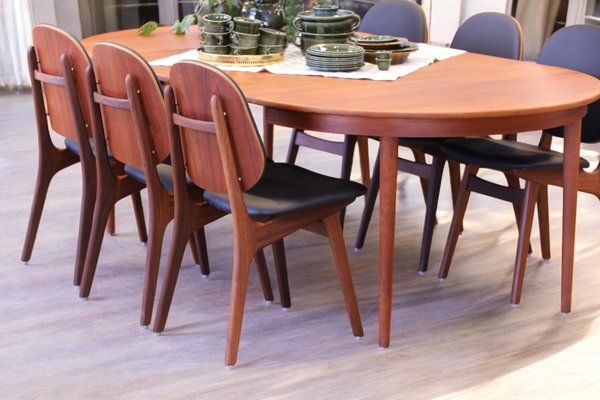 Model 75 Chairs in Teak and Black Leather by Arne Hovmand Olsen