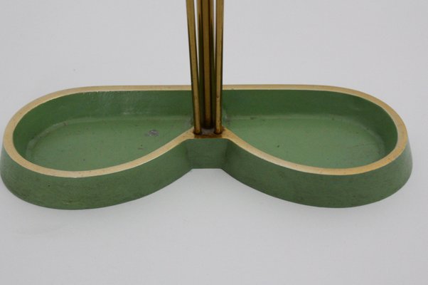 https://cdn20.pamono.com/p/g/2/4/245253_160x9r0mrq/green-lacquer-brass-aluminum-umbrella-stand-1950s-8.jpg