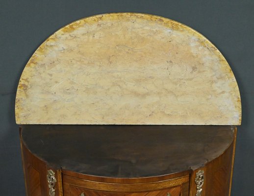 118) Commode en placage d'amarante à monture de bronze doré d'époque