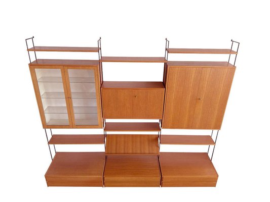 Omnia Wall System in Walnut from Hilker, 1960s for sale at Pamono