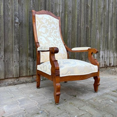Fauteuil Voltaire et repose pieds