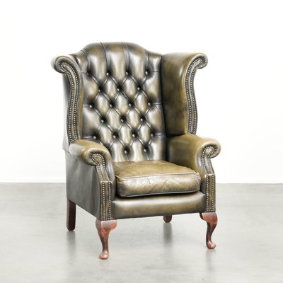 Englischer Chesterfield Ohrensessel aus Rindsleder in Grün bei Pamono kaufen