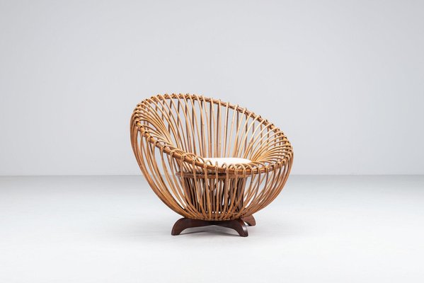 Lounge Chair in Rattan and Teak in the style of Franco Albini