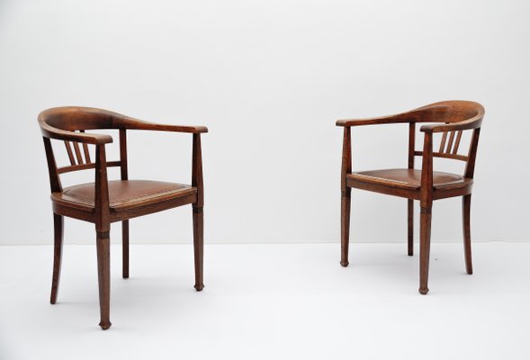 Deutsche Vintage Art Deco Armlehnstühle aus Holz & Leder, 1930er, 2er Set bei Pamono kaufen