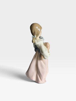 Lladro, Arms Full of Love Girl Figurine, 2000, Porcelain for sale