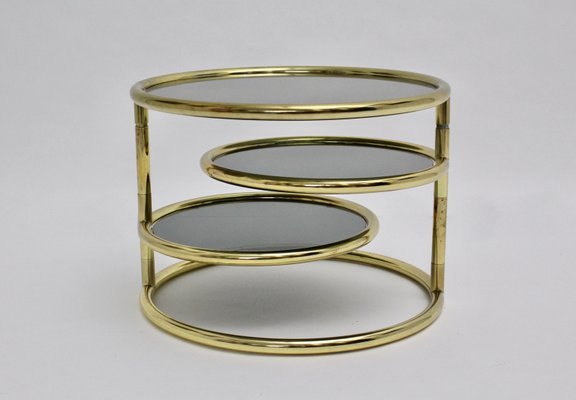 Brass swivel coffee on sale table