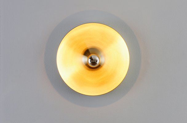 Wandleuchte über Runden Spiegel - The Homey Design