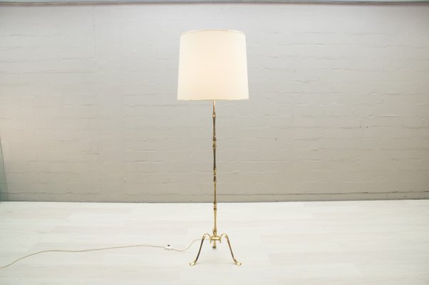 brass tripod floor lamp