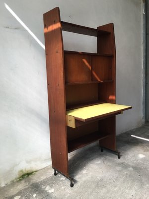 Bookcase with pull out desk outlet