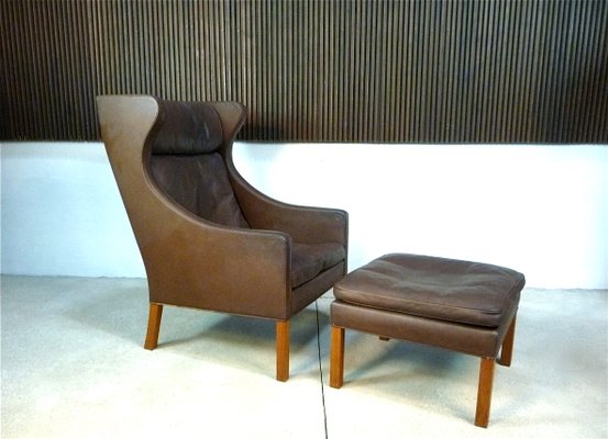 Leather wing chair and ottoman deals