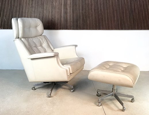 Tufted leather chair and ottoman sales