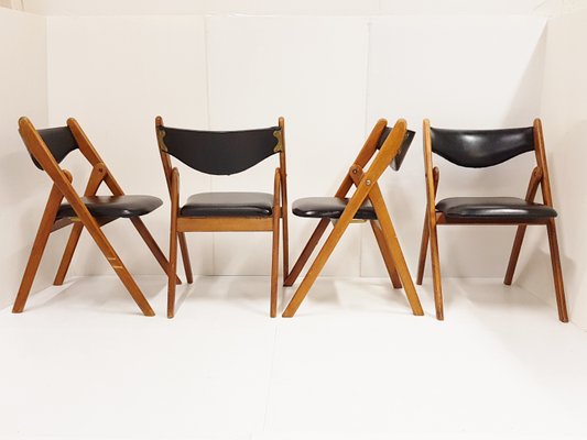 Scandinavian Teak And Leatherette Folding Chairs 1960s Set Of 4 Scandinavian Teak And Leatherette Folding Chairs 1960s Set Of 4 1