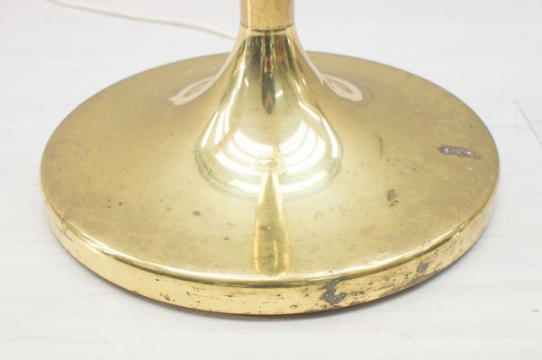 gold and glass floor lamp