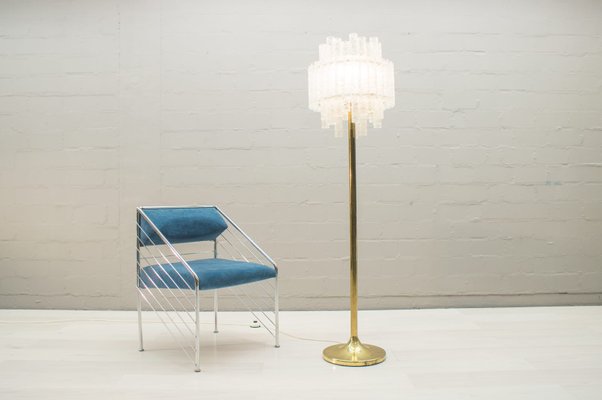 gold and glass floor lamp