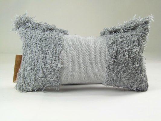 gray furry pillow
