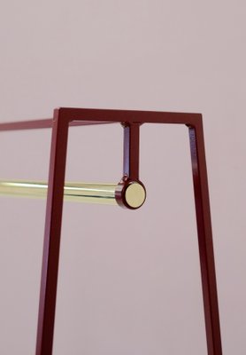A Clothes Rail in Beetroot with a Brass Pole by &New for sale at