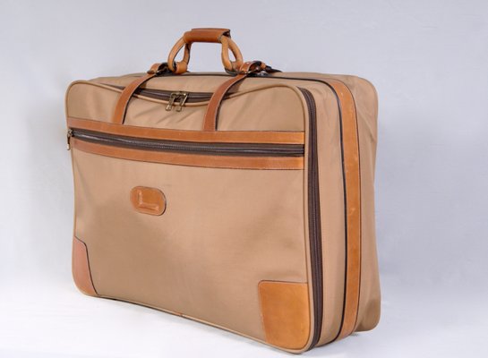 vintage suitcase with wheels