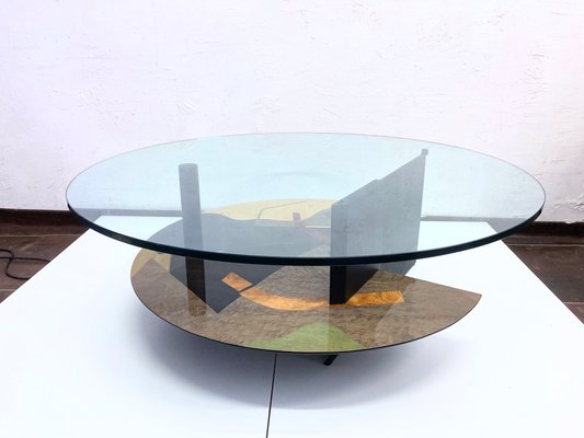Glass rotating 2024 coffee table