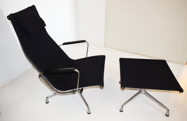Model Ea124 Swivel Chair With Ea125 Footrest By Charles Ray