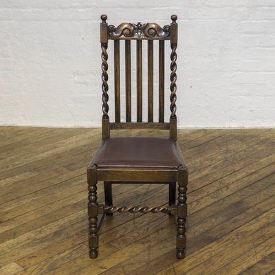 Sold at Auction: A pair of Jacobean style straight back chairs