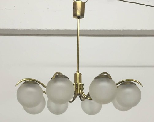 Brass chandelier with glass globes deals