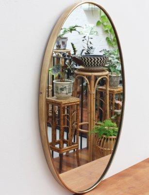 Mid Century Oval Shaped Italian Brass Framed Wall Mirror 1950s Italian Brass Framed Wall Mirror