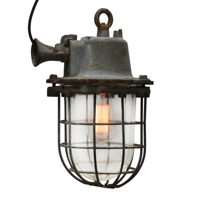 Graue industrielle Vintage Gitterlampe aus Gusseisen Graue industrielle Vintage Gitterlampe aus Gusseisen