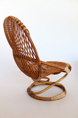 Vintage cane swivel chair deals