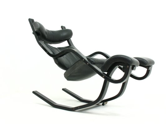 Leather And Wood Gravity Balans Lounge Chair From Stokke 1980s