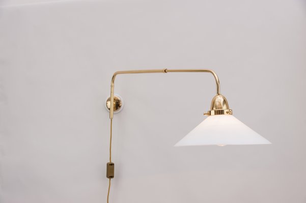 Lampada da parete Art Déco allungabile in ottone, anni '20 Lampada da parete Art Déco allungabile in ottone, anni '20