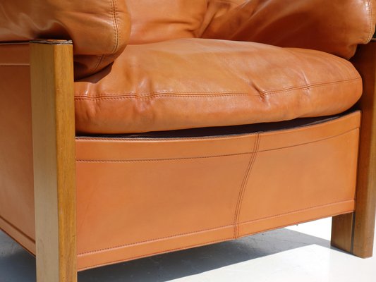 Leather and wood chair with ottoman deals