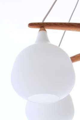 Scandinavian Modern Oak and Opaline Glass Octopus Chandelier by Uno & Östen Kristiansson for Luxus, 1950s Scandinavian Modern Oak and Opaline Glass Octopus Chandelier by Uno & Östen Kristiansson for Luxus, 1950s