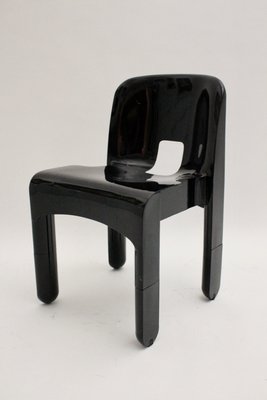 Model 4860 Universale Black Plastic Chairs By Joe Colombo For Kartell 1970s Set Of 4 For Sale At Pamono