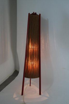 red tripod floor lamp