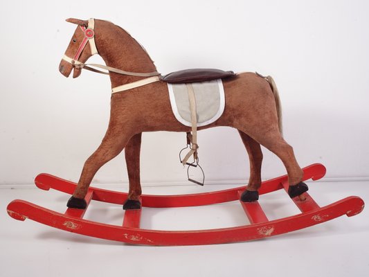 cheval à bascule pour enfant