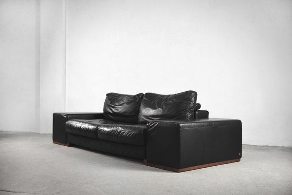 Natuzzi black leather sofa deals