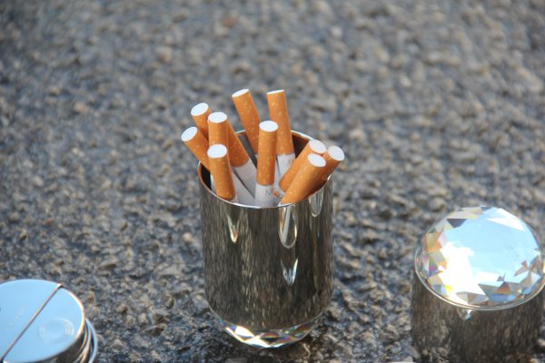 symptoms of smelling cigarette smoke Has anyone tried this? For almost 3 years I have very little taste. I can  smell but often have strong phantom smells like cigarette smoke, ammonia  and burnt cookies. I've lost 43