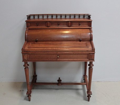 https://cdn20.pamono.com/p/g/5/2/520347_x2osmkweb0/vintage-walnut-cylinder-desk-1.jpg